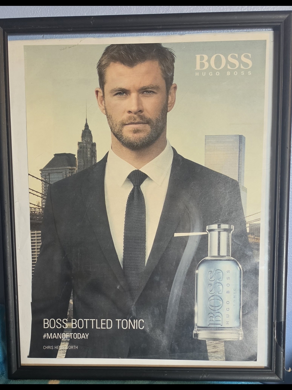 Hugo Boss Men’s Fragrance Poster With Blue Bottle With And Chris Hemsworth